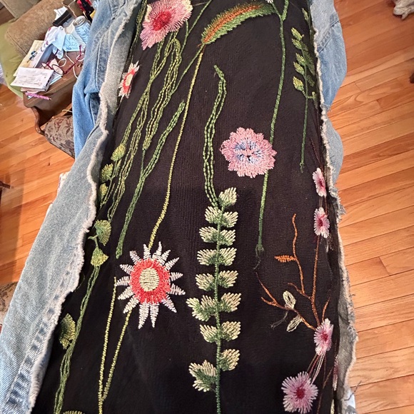 Revamped distressed look jean jacket. Floral lace inert details. - Picture 3 of 5